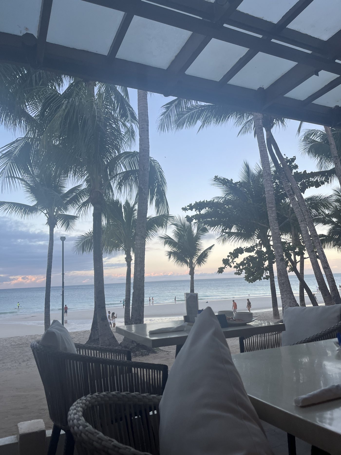 Beachfront dining Philippines sunset